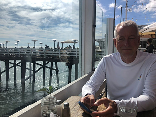 Dan Arbrust poses on vacation