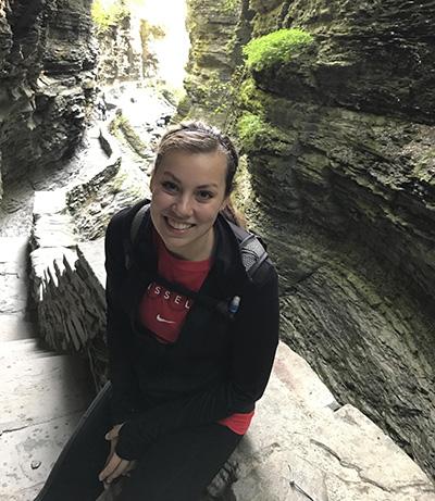 Christina Gilliland outside on a rocky nature trail