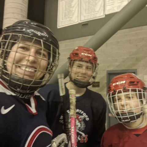 Jonna Gerken and family in hockey gear