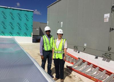 Robin Kemper and a colleague in safety gear