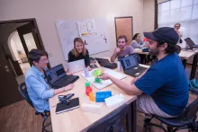 Inventor's Studio students sitting at tables