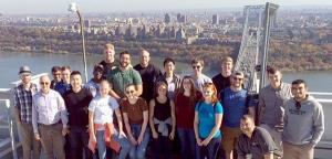 Group of students outside overlooking a bridge and city